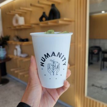 Humanity Coffee - Matcha latte. Love the paper cups, reducing use of plastic - Coffee & Tea Near Me - Newport Beach, California
