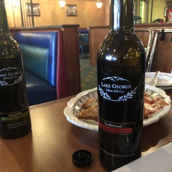 Mezzaluna's - Lake George Olive Oil Company EVO comes with the excellent warm bread. - Italian Near Me - Lake George, New York Mezzaluna's - Lake George Olive Oil Company EVO comes with the excellent warm bread. - Italian Near Me - Lake George, New York