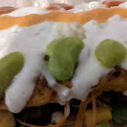 A magical cachapa ( a stuffed corn cake) with salsa de cilantro, pique y guayaba. A magical cachapa ( a stuffed corn cake) with salsa de cilantro, pique y guayaba.