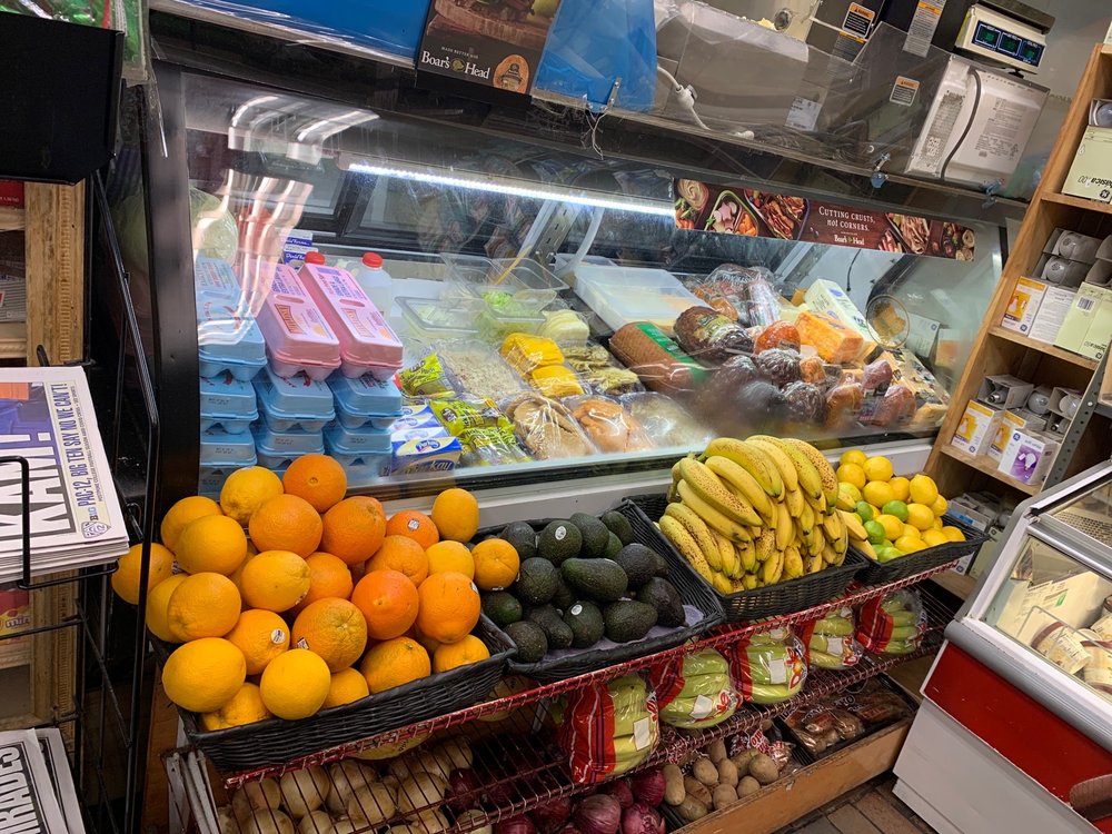 Taino Fast Way Deli & Grocery Logo