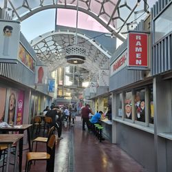 Pisa Pizza - Promenade where Pisa Pizza is located across from the Blue Sour Patch Kid sign, lol