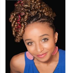 Hair set on Flexi rods with two strand twists up style. Hair is highlighted with blonde and pink hues