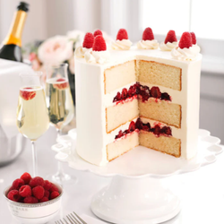 Cozy Cakehaus - The sophisticated Raspberry Champagne Cake is the perfect way to toast any celebration!