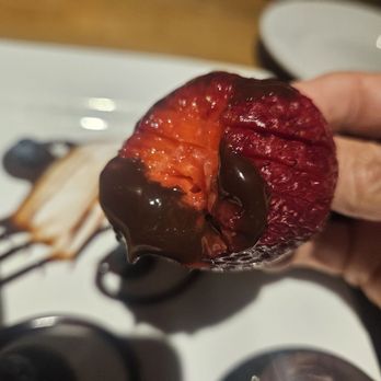 Hop Social Grill - I've never seen strawberries scored like this but the strawberry was perfectly ripe and the cuts help get more chocolate sauce in it! - American Near Me - Chandler, Arizona Hop Social Grill - I've never seen strawberries scored like this but the strawberry was perfectly ripe and the cuts help get more chocolate sauce in it! - American Near Me - Chandler, Arizona