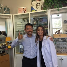 Dr. Ngo with a patient. You can see Kat in the mirror. Yeah!!