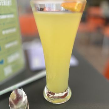 Snooze, an A.M. Eatery - Mimosa with a splash of pineapple - Breakfast & Brunch Near Me - Houston, Texas Snooze, an A.M. Eatery - Mimosa with a splash of pineapple - Breakfast & Brunch Near Me - Houston, Texas
