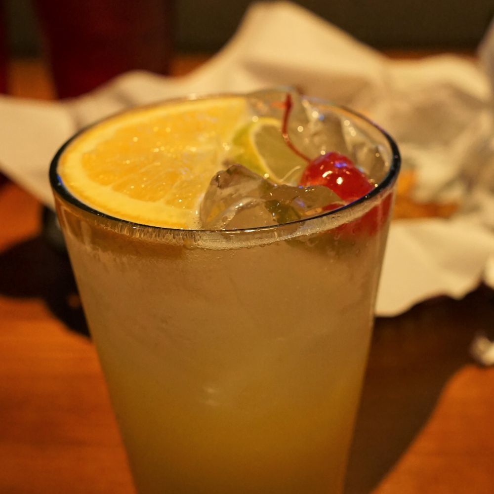 Kickback Jack's - a drink with a slice of lemon - American Near Me - Fayetteville, North Carolina