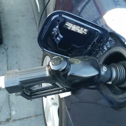 76 Gas Station - Pumping  gas.