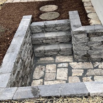 Roma Landscaping - a stone retaining wall and steps - Landscaping Near Me Roma Landscaping - a stone retaining wall and steps - Landscaping Near Me