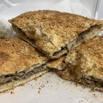 Kushari and Grill - Food: Hawashi (Cross-Section) - Egyptian Near Me - Medford, Massachusetts Kushari and Grill - Food: Hawashi (Cross-Section) - Egyptian Near Me - Medford, Massachusetts
