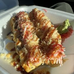 O-Saki Express - Farmington Roll: shrimp tempura, cream cheese and avocado inside; top with crab meat mixed with tempura flakes, spicy mayo and eel sauce.