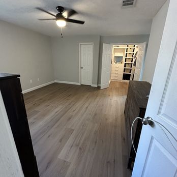 Willow Floors - an empty room with a ceiling fan - Flooring Near Me - Plano, Texas Willow Floors - an empty room with a ceiling fan - Flooring Near Me - Plano, Texas