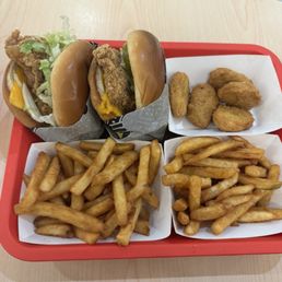 (Top left) deluxe chicken sandwich, (top right) nuggets, (bottom) fries (Top left) deluxe chicken sandwich, (top right) nuggets, (bottom) fries