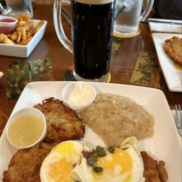 Veal Schnitzel, potato pancake and a good German beer! Veal Schnitzel, potato pancake and a good German beer!
