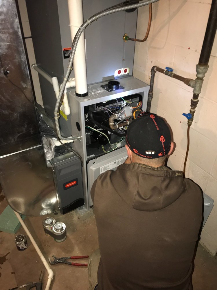 Slide of EZ HEAT Heating, Cooling & Plumbing