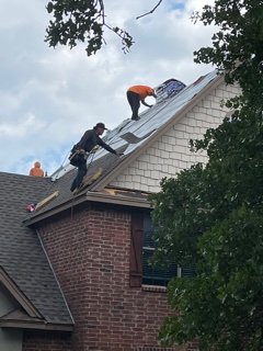 Slide of Arnold's Roofing