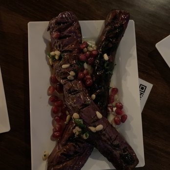 Palo Tapas Bar - Berenjenas (grilled eggplant with yogurt, honey and pomegranates) - Tapas Bars Near Me - Providence, Rhode Island Palo Tapas Bar - Berenjenas (grilled eggplant with yogurt, honey and pomegranates) - Tapas Bars Near Me - Providence, Rhode Island