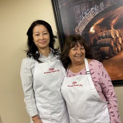 We LOVE getting pictures of our happy customers with their swag!! Embroidered aprons for our friends at Souther Glaciers Wine & Spirits!! :)