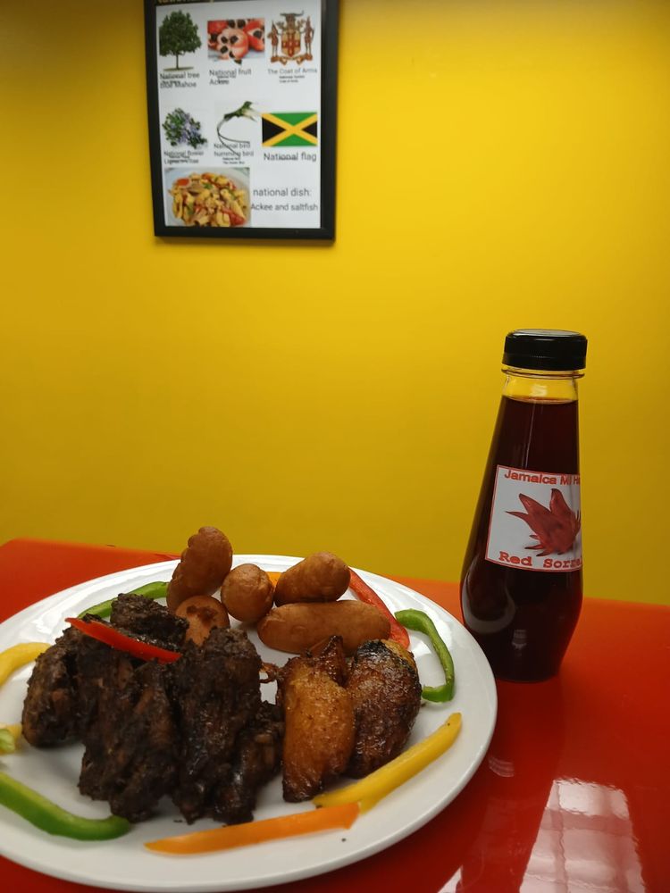 Jamaica MI Happy Restaurant Logo