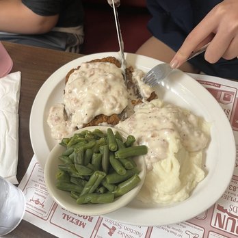 Ruthie's Diner - Chicken fried steak with green beans and sausage gravy. - Diners Near Me - Ligonier, Pennsylvania Ruthie's Diner - Chicken fried steak with green beans and sausage gravy. - Diners Near Me - Ligonier, Pennsylvania