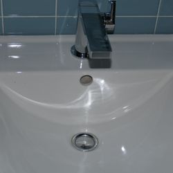 Peabody Supply Co & the Bath Showcase - Kohler faucet and American Standard sink