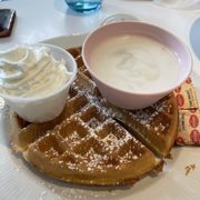 Photo of Bogart's Cafe - Honolulu, HI, United States. Waffle (they gave us a side of Haupia sauce to try - totally delicious)