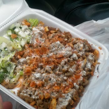 Gyro King - Mixed grill (chicken and lamb) over rice ($9) - Food Trucks Near Me - Houston, Texas Gyro King - Mixed grill (chicken and lamb) over rice ($9) - Food Trucks Near Me - Houston, Texas