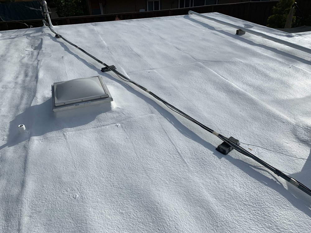 Slide of Dura-Foam Roofing & Solar Center