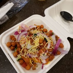 Hot Indian - Chicken Tikka Marsala With white rice Hi slaw, the other slaw, onions, sev and fried chicken peas