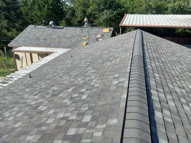 Slide of Truly Roofing & Construction