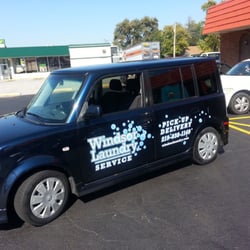 Windsor Laundry - This is the delivery vehicle. The police car is parked at the subway sandwich,next door.