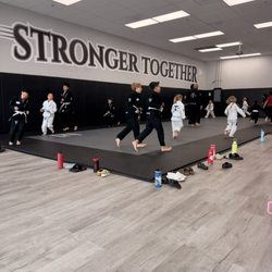 Titanium Jiu Jitsu - All ages warm up together which helps everyone settle in