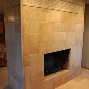 Shepherd Stoneworks - a fireplace in a living room - General Contractors Near Me - Mercer Island, Washington