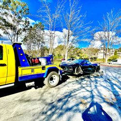 Corte Madera Tow - Wheel lift and dollies in action
