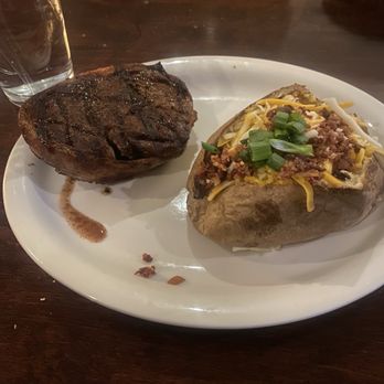 The Butcher Shop Steakhouse - 10oz. Filet Mignon Baked Potato - Steakhouses Near Me - Memphis, Tennessee The Butcher Shop Steakhouse - 10oz. Filet Mignon Baked Potato - Steakhouses Near Me - Memphis, Tennessee