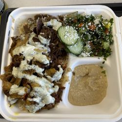 Mr Greek Donair kabab - Lamb/Beef platter, Tabouli Salad and Hummus with Pita bread.