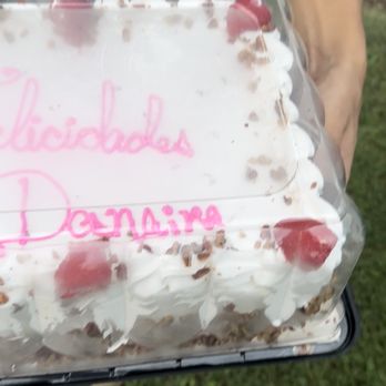 Cold Stone Creamery - a woman holding a cake - Ice Cream & Frozen Yogurt Near Me - Mayaguez, Puerto Rico