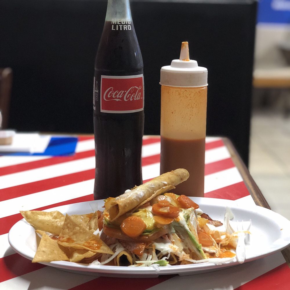 La Esquina De Pepe #2 - a plate of nachos and a bottle of coke - Mexican Near Me - Irving, Texas La Esquina De Pepe #2 - a plate of nachos and a bottle of coke - Mexican Near Me - Irving, Texas
