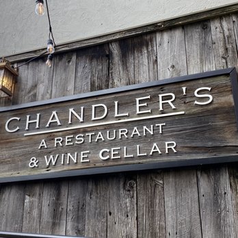 Chandler's - a sign for chandler's restaurant and wine cellar - New American Near Me - Petoskey, Michigan