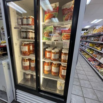 MODU MART - a refrigerator with food in it - International Grocery Near Me - Ann Arbor, Michigan