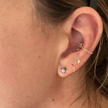 Diamond Eyez Nola - Conch piece with custom chain - Piercing Near Me - New Orleans, Louisiana