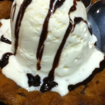 Chili's - Chocolate Chip cookie with Ice Cream and chocolate sauce drizzle - Tex-Mex Near Me - Waipahu, Hawaii Chili's - Chocolate Chip cookie with Ice Cream and chocolate sauce drizzle - Tex-Mex Near Me - Waipahu, Hawaii