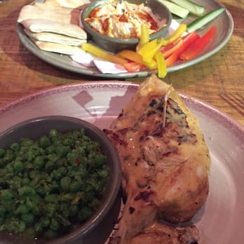 Nando's Peri-Peri - 1/4 Chicken, Macho peas, and a hummus platter. - Portuguese Near Me - Ashburn, Virginia Nando's Peri-Peri - 1/4 Chicken, Macho peas, and a hummus platter. - Portuguese Near Me - Ashburn, Virginia