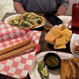 Churos, carne asada tacos, birria tacos