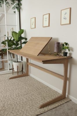 Custom White Oak Drawing Desk - This desk was designed for our customer’s specific needs. Being an artist, they needed the mid section to be able to lift up to suit their various needs.