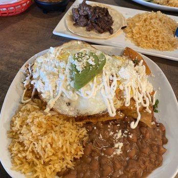 Mariscos El Ranchito - Chilaquiles plate and child asada taco with side of rice - Mexican Near Me - Anaheim, California Mariscos El Ranchito - Chilaquiles plate and child asada taco with side of rice - Mexican Near Me - Anaheim, California