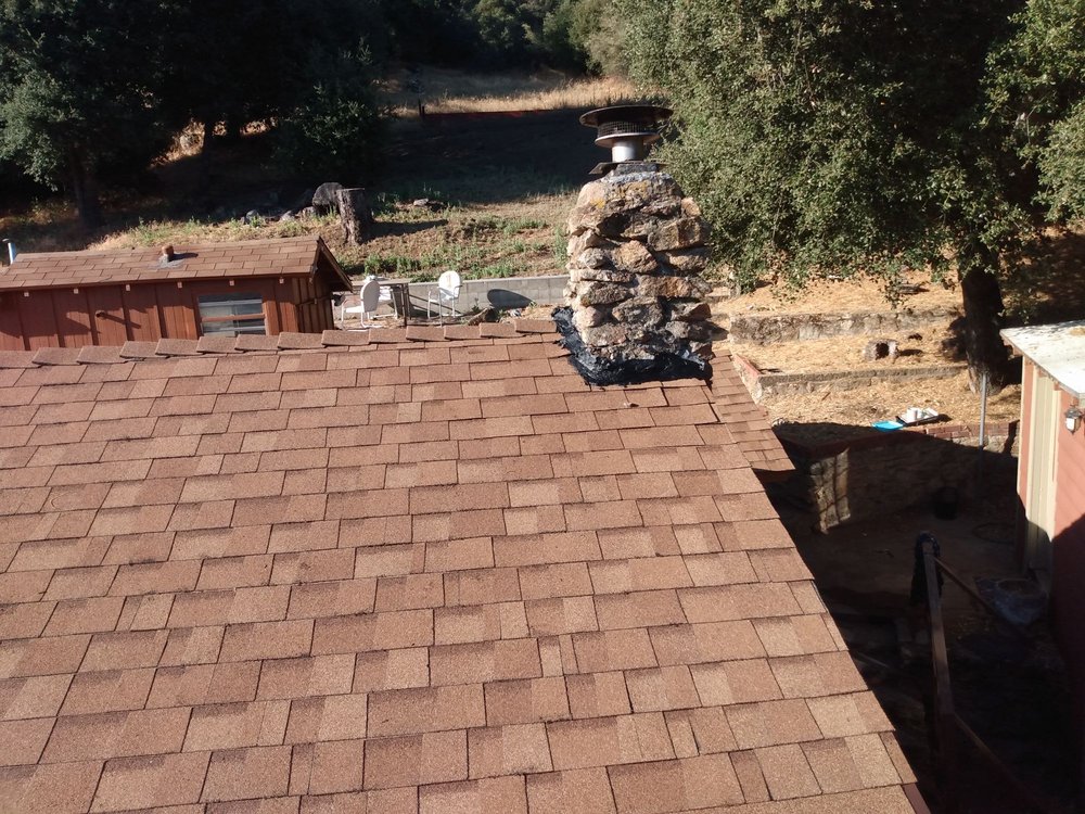 Slide of Outlaw Roofing