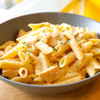 Pasta di Guy - Penne Pasta with homemade Alfredo sauce and grilled chicken. Topped with Parmesan cheese and herbs. - Italian Near Me - Fort Wayne, Indiana