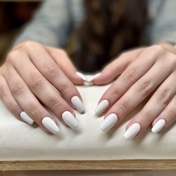 Gel extensions and manicure in a clean crisp white for summer