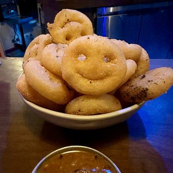 Broken Compass Tiki - Smiley potato faces. They have so many house made sauces to choose from so this was such a fun dish. - New American Near Me - Burbank, California Broken Compass Tiki - Smiley potato faces. They have so many house made sauces to choose from so this was such a fun dish. - New American Near Me - Burbank, California